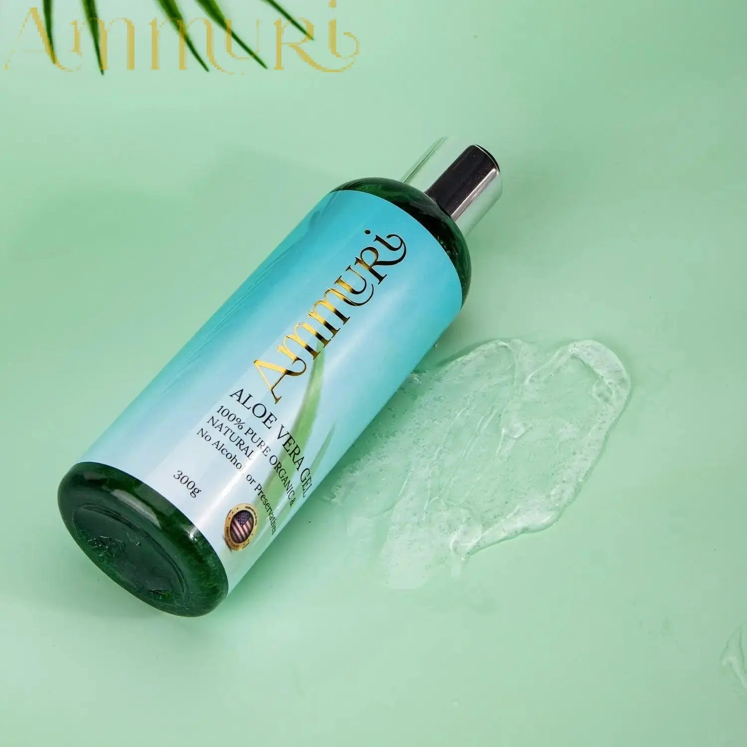 Ammuri Skincare organic aloe vera gel bottle with clear gel on green surface