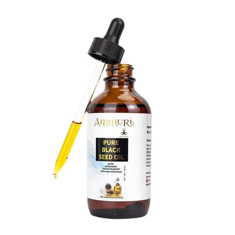 Ammuri Skincare pure black seed oil cold pressed in amber glass bottle with dropper for skincare benefits