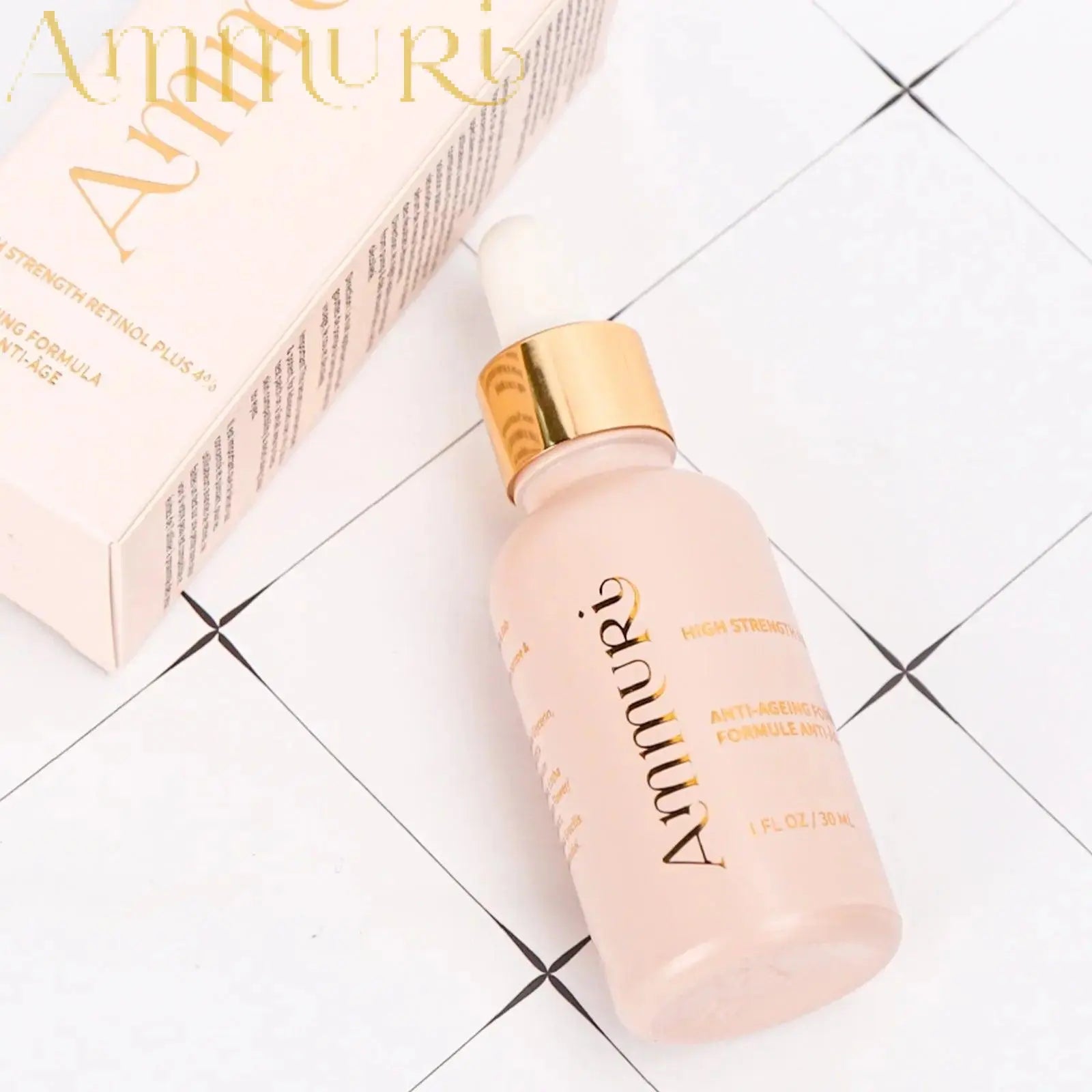 Ammuri Skincare high strength retinol serum in frosted glass bottle with gold dropper cap and packaging box