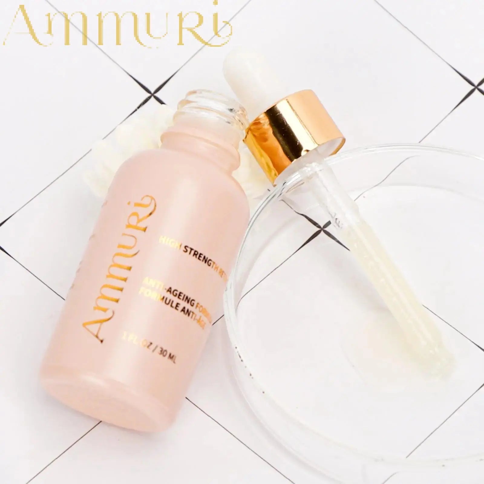Ammuri Skincare high strength retinol serum in frosted glass bottle with dropper on white tiled surface